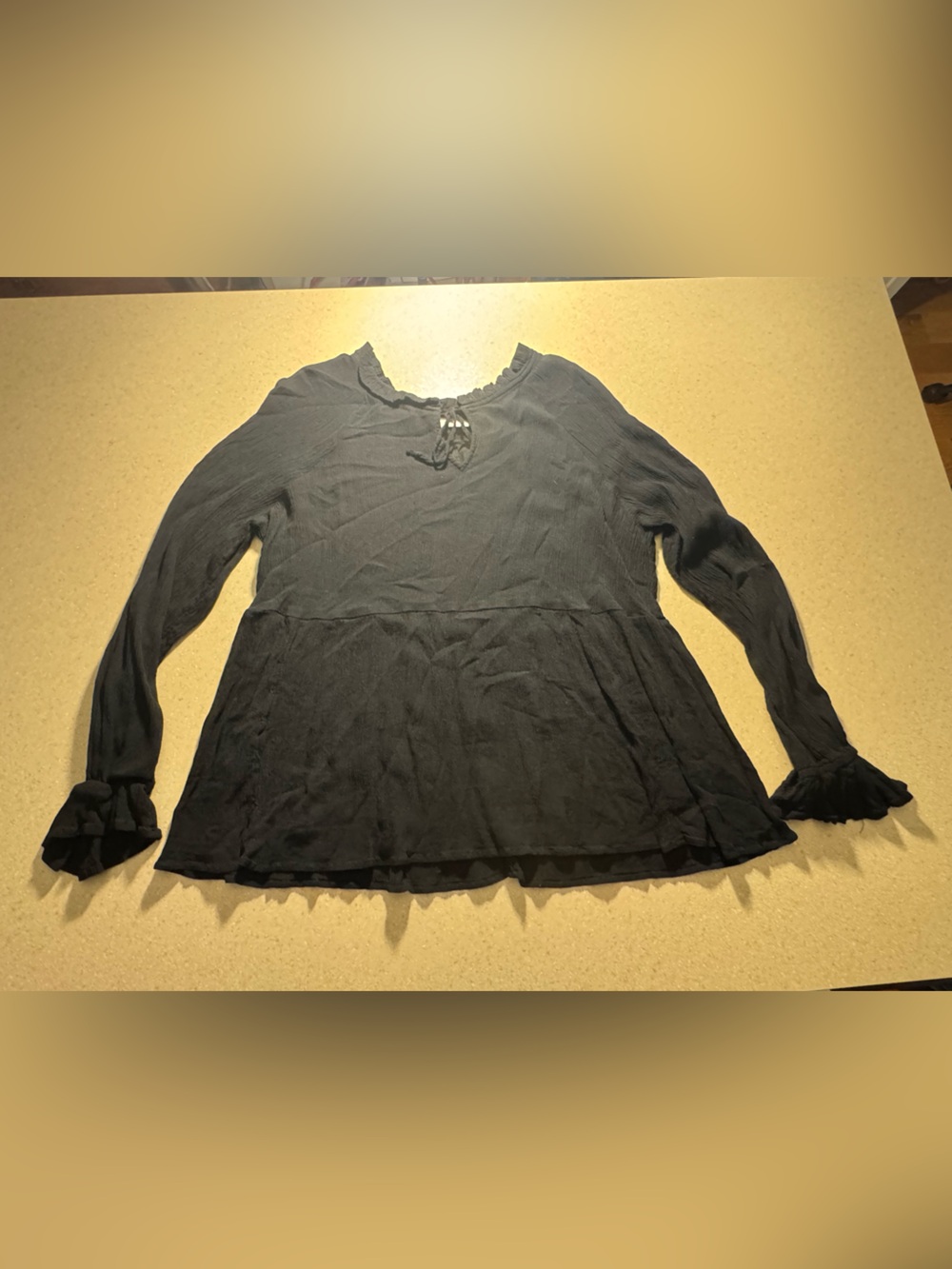 Wonderly Black Long-Sleeve Ruffled Peplum Blouse